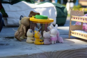 Little animals (calico critters) gather round to see Morgane's caterpillar zoo.