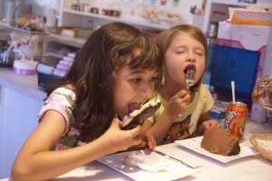 The girls may have enjoyed their desserts.