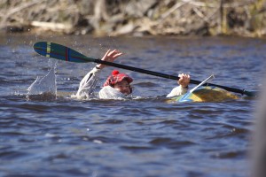 This competitor's pumpkin was not too buoyant, but he still finished the race.
