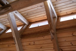 Windows along the roof line help provide light. The cabin is set up to work on passive solar heat meaning the sunlight comes in the cabin to warm it in the winter.