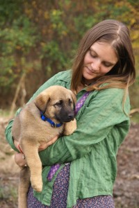 Sweet puppy and his proud owner.
