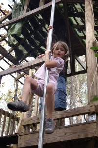 Morgane loved the pole on the tree house.