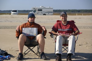 Ghis and Lawrence on the beach. "The fish was THIS big."