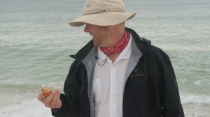 Ghis got wet chasing after this shell under the waves.